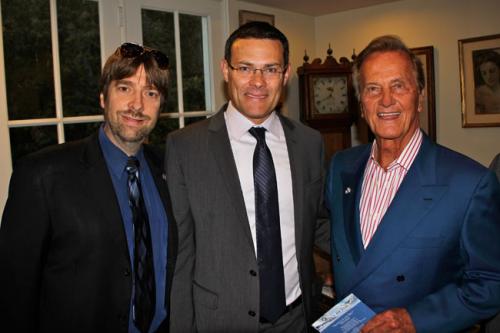 Producer Mike Flint with the Consul-General of Israel in Los Angeles, David Siegel, and Pat Boone